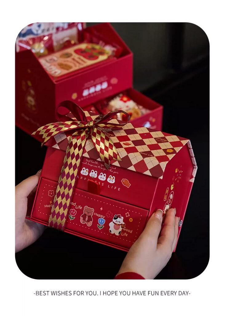 Wholesale red festive gift boxes stacked with ribbon bows